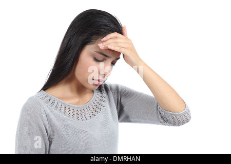 Beautiful arab woman with headache and the hand over forehead isolated on a white background Stock Photo