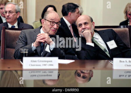 US Federal Reserve Chairman Ben Bernanke (right) and former Chairman Alan Greenspan talk before the start of the Federal Reserve Centennial Commemoration December 16, 2013 in Washington, D.C. Stock Photo