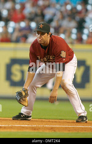 Houston Astros first baseman Lance Berkman (17) follows through on