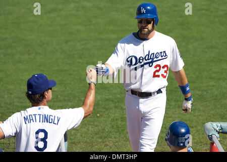 Los Angeles Dodgers' Jamey Carroll is congratulated by Casey Blake