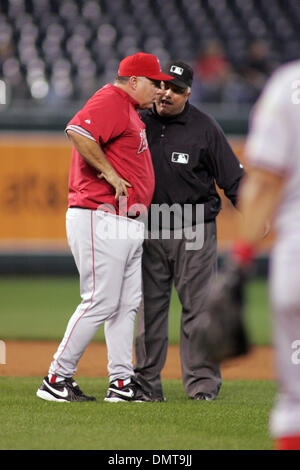 Los Angeles Angels manager Mike Scioscia hits to players during spring ...