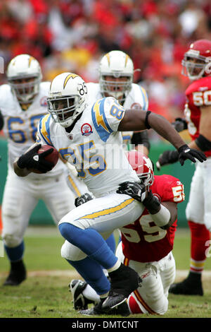 Kansas City Chiefs cornerback Brandon Carr (39) takes down San Diego  Chargers running back Darren Sproles (43) during the Chargers 37-7 victory  over the Chiefs at Arrowhead Stadium in Kansas CIty, Missouri. (