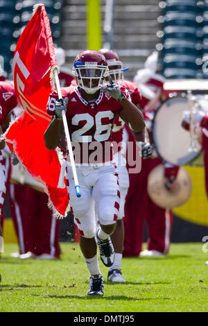 Temple Owls running back Joe Jones (26) bringing out the Temple Flag prior to the NCAA football game between the Buffalo Bulls and the Temple Owls at Lincoln Financial Field in Philadelphia, Pennsylvania.  The Temple Owls beat the Buffalo Bulls, 37-13. (Credit Image: © Chris Szagola/Southcreek Global/ZUMApress.com) Stock Photo