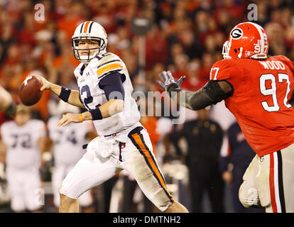 Auburn quarterback Chris Todd (12) scrambles under pressure at the game against Georgia in Sanford Stadium at the University of Georgia in Athens, Ga., on Saturday, November 14, 2009.  Georgia won 31-24. (Credit Image: © Daniel Shirey/Southcreek Global/ZUMApress.com) Stock Photo