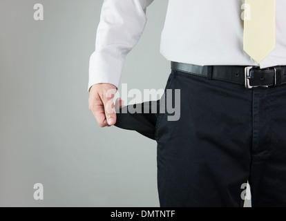 Close-up of a man showing empty pocket Stock Photo
