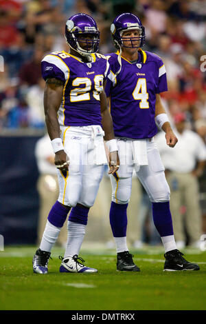 January 17 2010: Minnesota Vikings quarterback Brett Favre (4) raises his  helmet during The National Anthem. The Minnesota Vikings defeated the  Dallas Cowboys by a score of 34 to 3 at Mall