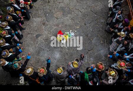 Lhasa, Tibet. 17th Dec, 2013. People pay homage to Palden Lhamo, a goddess in the Tibetan Buddhism, at the Jokhang Temple in Lhasa, capital of southwest China's Tibet Autonomous Region, Dec. 17, 2013. The Palden Lhamo Festival, which falls on the 15th day of the 10th month of the Tibetan calender, is celebrated by the female followers of Tibetan Buddhism to pray for a satisfactory marriage each year. Credit:  Purbu Zhaxi/Xinhua/Alamy Live News Stock Photo