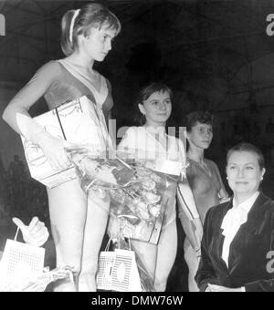 July 22, 1976 - Montreal, Canada - Fourteen year old Romanian gymnast NADIA COMANECI, the new queen of gymnastics, scores a ten out of ten on the beam and asymetric bars to win the Gold medal at the Olympic Games 1976 in Montreal. She is pictured with PRINCESS GRACE of Monaco (R). (Credit Image: © KEYSTONE Pictures USA/ZUMAPRESS.com) Stock Photo