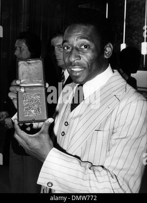 Sep. 14, 1976 - Paris, France - Brazilian footballer PELE holds up a medal after being honored at a party held at the Hotel de Ville in Paris.  (Credit Image: © KEYSTONE Pictures USA/ZUMAPRESS.com) Stock Photo