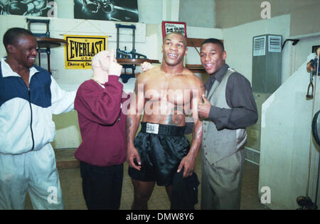Jan 28, 2002; Las Vegas, NV, USA; File Photo: 1999.  ! (LtoR) Trainer FLOYD MAYWEATHER SR. Boxers ANGEL MANFREDDY, MIKE TYSON and FLOYD MAYWEATHER JR. @ the Golden Gloves Gym. Tyson will face Nevada Boxing Commision Jan. 29th to recieve boxing license to fight Lennox Lewis in April, 2002. Mandatory Credit: Photo by Mary Ann Owen/ZUMA Press. (©) Copyright 2002 by Mary Ann Owen Stock Photo