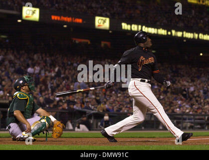 Mar 28, 2002; San Francisco, CA, USA; San Francisco Giants' Barry Bonds,  #25, points to the sky after hitting a homerun in the 4th inning of their  exhibition game against the Oakland