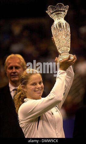 Nov 11, 2002; Los Angeles, CA, USA; Tennis ace KIM CLIJSTERS of Belgium raises the Billie Jean King trophy after defeating Serena Williams  7-5,6-3 in the 2002 Home Dopot Championships at Staples Center in Los Angeles. Stock Photo