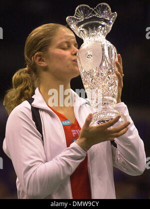 Nov 11, 2002; Los Angeles, CA, USA; Tennis ace KIM CLIJSTERS of Belgium  kisses the Billie Jean King trophy after defeating Serena Williams  7-5,6-3 in the 2002 Home Dopot Championships at Staples Center. Stock Photo