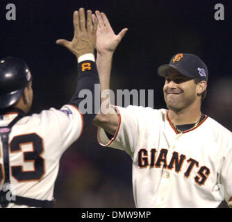 Oct 23, 2002 - San Francisco, CA, USA - ROBB NEN high fives with Benito Santiago after the Giants won their first World Series game in San Francisco since 1962. The Giants took Game 4 from Anaheim 4-3. (Credit Image: © Karl Mondon/Contra Costa Times/ZUMA Press) RESTRICTIONS: USA Tabloids RIGHTS OUT! Stock Photo