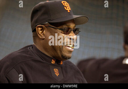 San Francisco Giants manager Dusty Baker, left, introduces, from left,  first baseman J.T. Snow, pitcher Shawn Estes, third baseman Bill Mueller,  right fielder Ellis Burks, and coach Ron Wotus during a new