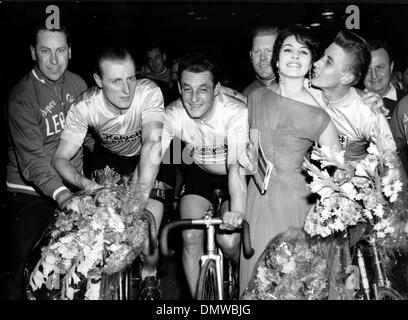 Nov. 14, 1958 - Paris, France - JACQUES ANQUETIL, ANDRE DARRIGADE and FERDINANDO TERRUZI, the Franco-Italians won the Paris 'Six Days' cycling race last night. PICTURED: (from L-R) Darrigade, Terruzi and Anquetil congratulated by MICHELE MERCIER, the queen of the 'Six Days'.  (Credit Image: © KEYSTONE Pictures USA/ZUMAPRESS.com) Stock Photo