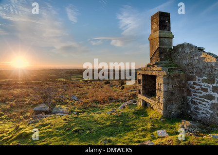 Sunset over ruins Carbilly Tor on Bodmin Moor in Cornwall Stock Photo