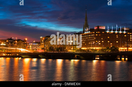 Evening view of Sheraton Hotel (1971) and lower Vasagatan, Norrmalm, Stockholm, Sweden. Stock Photo