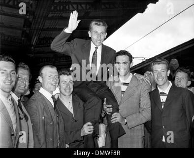 Oct. 6, 1960 - Paris, France - After his victory in the cycle race in Italy, French champion JACQUES ANQUETIL arrived today in Paris. PICTURED: Jacques on his arrival to the Paris Gare De Lyon, congratulated by other champions. (Credit Image: © KEYSTONE Pictures USA/ZUMAPRESS.com) Stock Photo