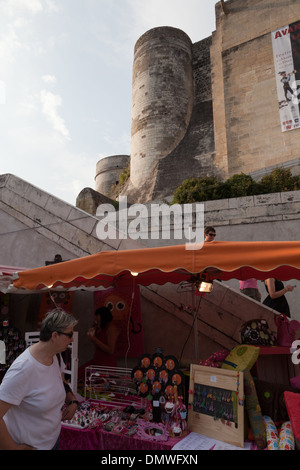Amboise summer evening market, woman looking at earrings on stall Stock Photo
