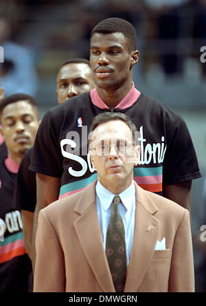 Nov 01, 1991; San Antonio, TX, USA; Coach Larry Brown and David Robinson stand while the National Anthem takes place in a game against the Dallas Mavericks at the HemisFair Arena in San Antonio on January 16, 1991. Stock Photo