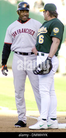 Jun 21, 2001; Oakland, CA, USA;  San Francisco Giants Barry Bonds and Oakland A's Jason Giambi talk at first base during game at Network Associates Coliseum in Oakland, Calif. Saturday June 09, 2001. Stock Photo