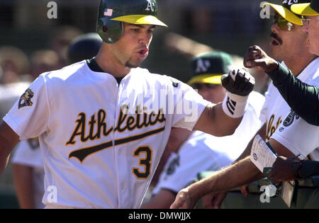 Oct 13, 2001; Oakland, CA, USA; Oakland A's Jason Giambi attempts