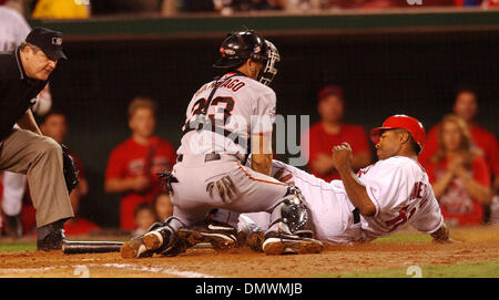 Oct 27, 2002 - Anaheim, CA, USA - San Francisco Giants catcher BENITO SANTIAGO, left, tags out GARRET ANDERSON of the Anaheim Angels  in the third inning of game 7 of the 2002 World Series on Sunday, October 27, 2002 at Edison Field in Anaheim, Calif.  (Credit Image: © Karl Mondon/Contra Costa Times/ZUMA Press) RESTRICTIONS: USA Tabloids RIGHTS OUT! Stock Photo