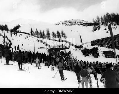 Feb 06, 1948; St. Moritz, Switzerland; General view showing the two courses with the spectators watching in the center. On the right is the slalom course for men and on the left the slalom course for women during the Olympic Games at St. Moritz in Switzerland. (Credit Image: © KEYSTONE Pictures USA) Stock Photo