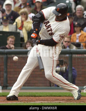 Mar 28, 2002; San Francisco, CA, USA; San Francisco Giants' Barry Bonds,  #25, points to the sky after hitting a homerun in the 4th inning of their  exhibition game against the Oakland