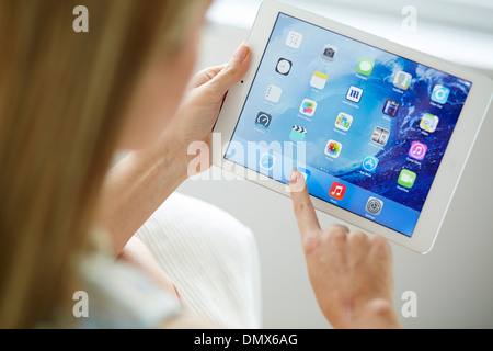 Woman using iPad Stock Photo