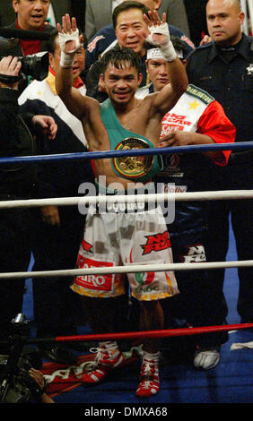 Jan 21, 2006; Las Vegas, NV, USA; MANNY PACQUIAO of the Philippines, celebrates after stopping Erik Morales in the 10th round to win the super featherweight boxing match Saturday night. Mandatory Credit: Photo by J.P. Yim/ZUMA Press. (©) Copyright 2006 by J. P. Yim Stock Photo
