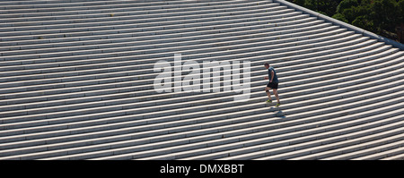 WASHINGTON, DC, USA - Man climbs stairs at the Watergate on the Potomac RIver. Stock Photo