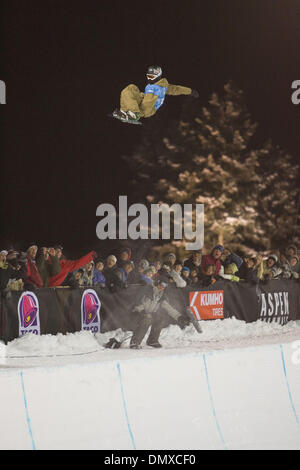 Snowboarder Shaun White, of Carlsbad, Calif., raises his arms at the bottom  of the superpipe after winning tonight's competition on Sunday, Jan., 27,  2008, at the Winter X Games at Buttermilk Ski