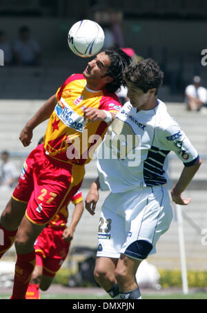 Mar 19, 2006; Mexico City, Mexico; UNAM Pumas midfielder MARCO ANTONIO PALACIOS (R) fights for the ball with UAG Tecos defender JUAN LEANO during their soccer match at the University Stadium in Mexico City. UAG Tecos won 1-0 against the UNAM Pumas. Mandatory Credit: Photo by Javier Rodriguez/ZUMA Press. (©) Copyright 2006 by Javier Rodriguez Stock Photo