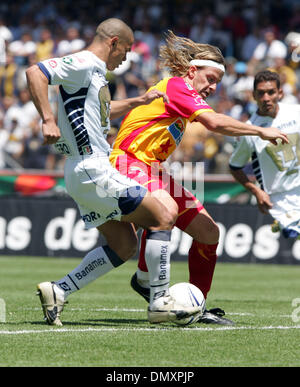 Mar 19, 2006; Mexico City, Mexico; UNAM Pumas defender DARIO VERON (L) fights for the ball with UAG Tecos forward CARLOS DAVID CASARTELLI during their soccer match at the University Stadium in Mexico City. UAG Tecos won 1-0 against the UNAM Pumas. Mandatory Credit: Photo by Javier Rodriguez/ZUMA Press. (©) Copyright 2006 by Javier Rodriguez Stock Photo