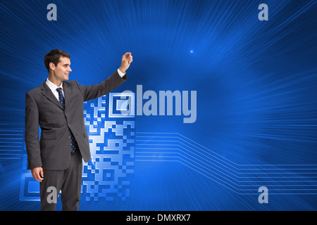 Composite image of smiling businessman holding something up in the air Stock Photo