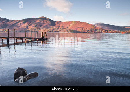 A jetty at the edge of Derwent Water in the Lake District national park. Stock Photo
