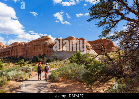 Walkers on the Devil's Garden Trail, Arches National Park, Utah, USA Stock Photo