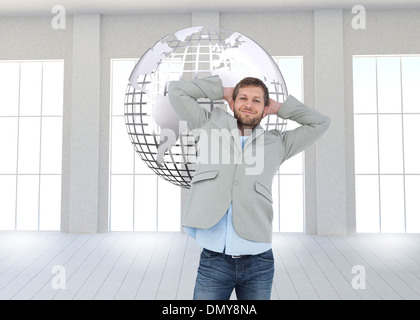 Composite image of suave man in a blazer with hands behind head looking at camera Stock Photo