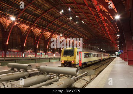 Train waiting to leave Antwerp Central Train Station (1905) in Antwerp, Belgium Stock Photo