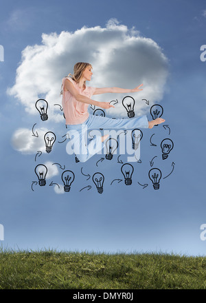 Composite image of woman doing dance pose Stock Photo