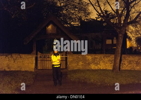Didcot, UK. 17th Dec, 2013. Police officer stand guard at entrance to All Saints Church and Graveyard, Didcot, Oxfordshire while they continue to search for missing teenager Jayden Parkinson on Tuesday 17 December 2013 Credit:  Nikreates/Alamy Live News Stock Photo