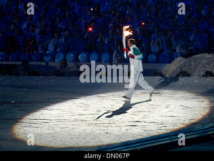 Feb. 12, 2010 - Vancouver, British Columbia, Canada - OLYMPICS OPENING CEREMONY -  Torchbearer Wayne Gretzky carries the torch at the XXI Winter Olympic Opening Ceremonies in the BC Palace on Friday February 12, 2010 in Vancouver, British Columbia. (Credit Image: © Paul Kitagaki Jr./ZUMApress.com) Stock Photo