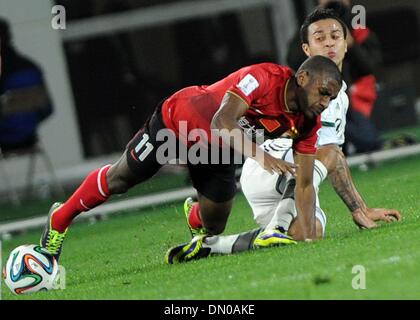 Agadir, Morocco. 17th Dec, 2013. Guangzhou Evergrande's Muriqui (Bottom) competes during the match between Guangzhou Evergrande and Bayern Munich at the FIFA's 2013 Club World Cup soccer match in Agadir, Morocco, Dec. 17, 2013. Bayern Munich won the match 3-0. Credit:  Liu Dawei/Xinhua/Alamy Live News Stock Photo