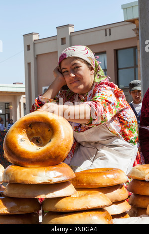 Woman selling non bread, Siyob Market, also known as Siab Market, Samarkand, Uzbekistan Stock Photo