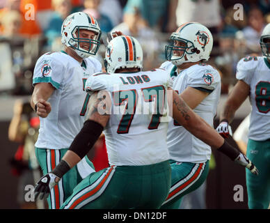 Photo: Miami Dolphins Joey Haynos and Chad Henne (7) react after