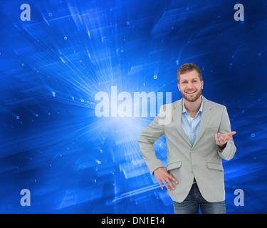 Composite image of stylish man smiling and gesturing Stock Photo