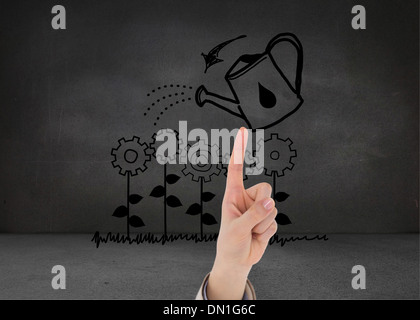 Composite image of businesswoman pointing Stock Photo