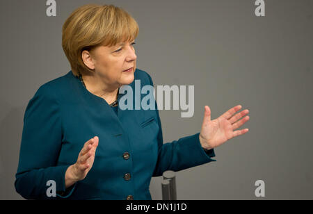 Berlin, Germany. 18th Dec, 2013. German Chancellor Angela Merkel makes the first government statement for the new legislature period in the German Bundestag in Berlin, Germany, 18 December 2013. Photo: Tim Brakemeier/dpa/Alamy Live News Stock Photo